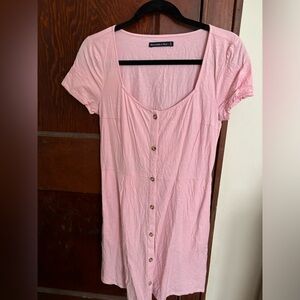 Pink short sleeve dress with buttons. Casual.